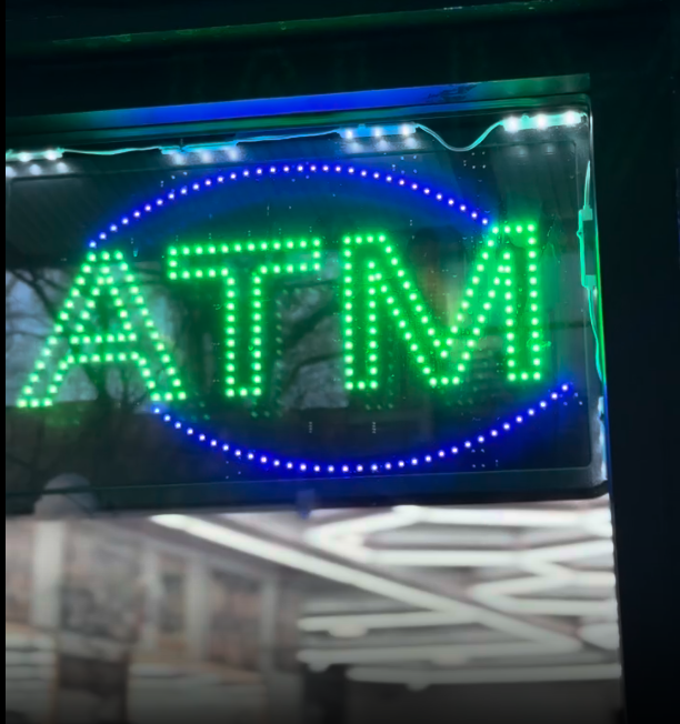 ATM inside El Caché 10 Barbershop Bronx NY